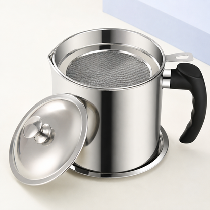 Three-quarter view of stainless steel cooking oil filter pot and fine mesh strainer