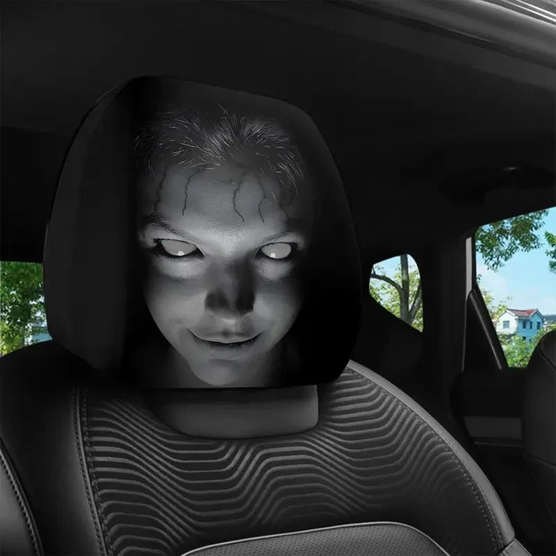 Single black horror face cover fitted over a car headrest