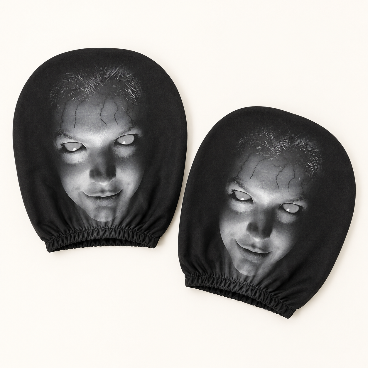 Two matching Pione ScareSeat horror face car headrest covers included in the set